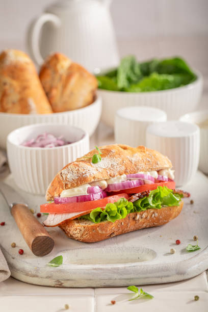 istock A nutritious and fresh sandwich with chicken, tomatoes, and lettuce. 2204131067