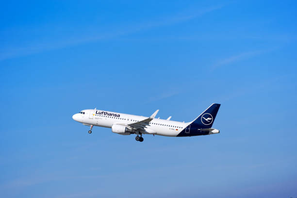 Lufthansa passenger airplane Airbus A320-200 registration D-AIWJ taking off form Swiss Airport Zürich Kloten on a sunny late winter day. Photo taken March 4th, 2025, Zurich Kloten, Switzerland.
