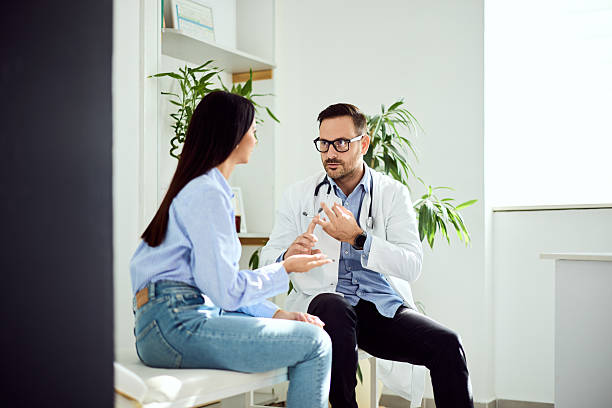 istock Medical Professional Engaging Patient in Informative Consultation in Office Setting 2204147706