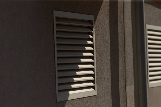 istock A detailed close up of a window that features shutters on it 2204151118