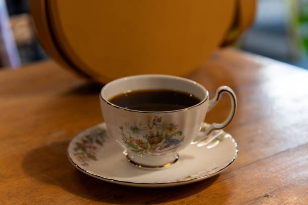 istock coffee and hand bag on the table 2204152631