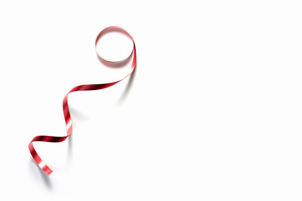 Red ribbon on white background. Concept of different holidays
