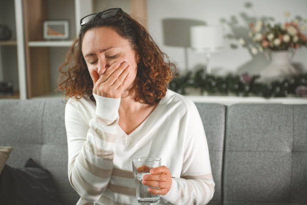 istock woman suffering from heatstroke at home 2204156263