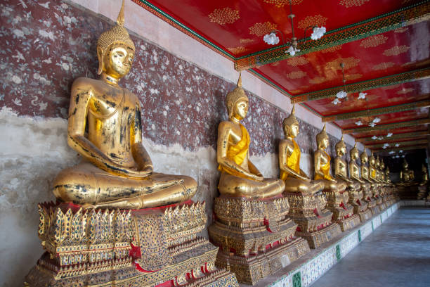Buddha statues in Wat Suthat Thepwararam (Wat Suthat for short). It is another of Bangkok’s oldest temples. Its construction started under the rule of Rama I in 1782, and finally completed in 1847 under the reign of Rama III, nearly seven decades later.