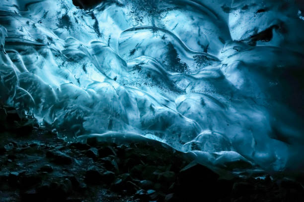 istock Majestic ice cave glowing in vatnajokull glacier, iceland 2204163985