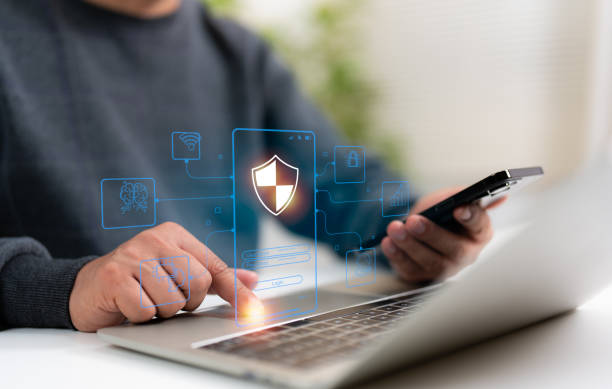 istock Hand of a man using laptop, secure access to user personal information, secure Internet access, cybersecurity, information security encryption. Cyber security internet network data privacy concepts. 2204164661