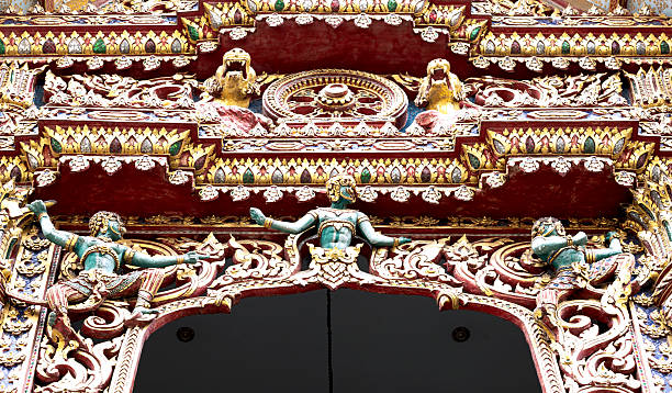 istock trio of green devils above the main door 2204166330