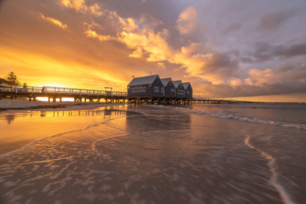 istock Busselton jetty at sunset with colourful clouds and calm water 2204171093