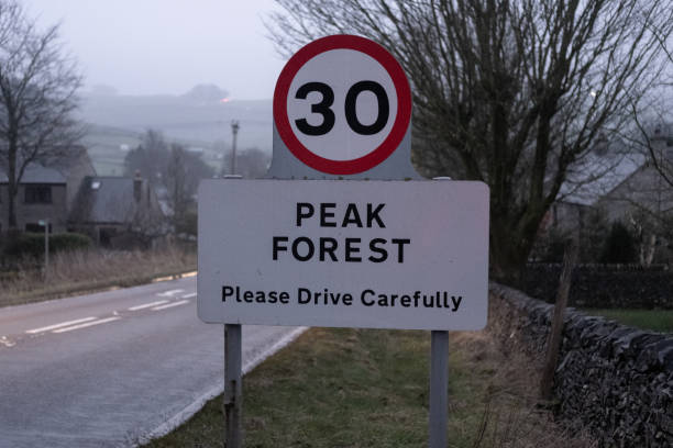 istock Peak Forest road sign in the Peak District 2204173174