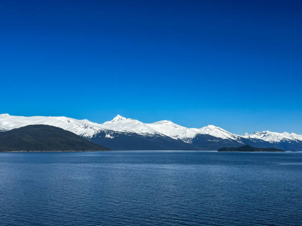 istock Snow-Capped Mountains and Deep Blue Waters in a Pristine Arctic Scene 2204173175