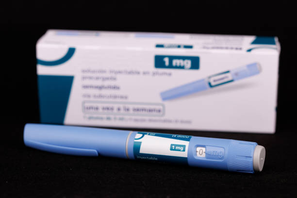 istock The Ozempic box and pen are elegantly placed on a black background, representing the semaglutide medication for diabetes care and weight management 2204174947