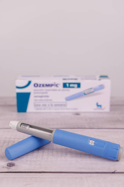 istock A semaglutide injection pen on a white-painted wooden table, with its packaging visible in the background, representing health and care 2204175028