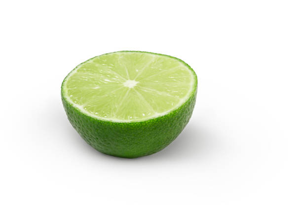 istock Half of lime isolated. Green citrus fruit cut. Sliced lime half with shadow 2204175829