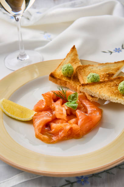 istock Elegant Salmon Tartare with Toasts A Culinary Art in Soft Lighting 2204177849