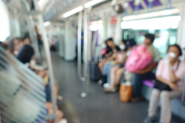 Blurred Bangkok MRT Train Interior, Abstract View of Commuters Inside Bangkok Subway, Out-of-Focus Public Transport Scene in Thailand