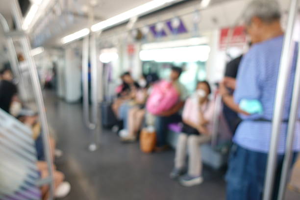 Blurred Bangkok MRT Train Interior, Abstract View of Commuters Inside Bangkok Subway, Out-of-Focus Public Transport Scene in Thailand
