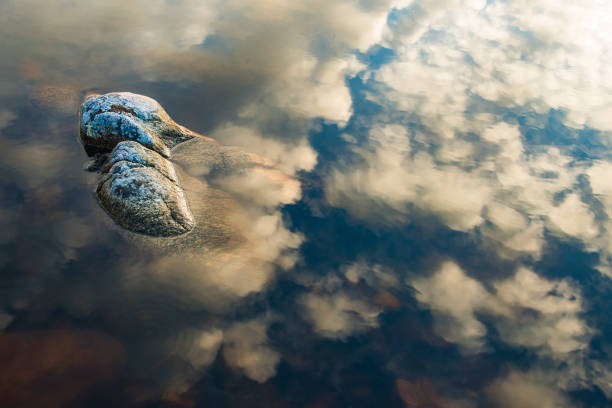 Two stones in beautiful clear and calm water