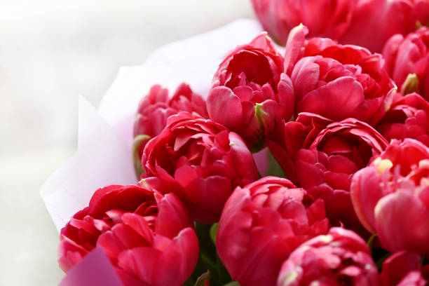 A close-up of a colorful tulip bouquet, adding a fresh and vibrant touch to the baby shower decor.