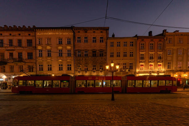 Lviv, Ukraine - March 5, 2025: Tram on  Market square in the evening