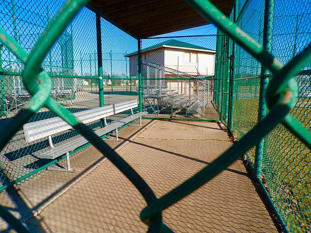 istock Baseball dugout on sunny day with blue sky. 2204183241