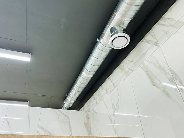 istock A pipe is presently suspended elegantly from the ceiling in a bathroom, providing not only a distinctive design element but also contributing to the overall functionality of the space 2204183736