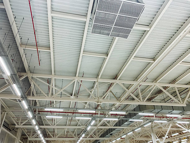 istock The spacious industrial warehouse features a contemporary ceiling designed with an advanced lighting system and modern air conditioning for optimal comfort and utility 2204183740