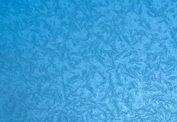 frost crystal on window glass in winter season