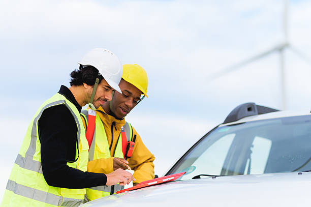 istock Engineers working on a wind turbine inspection using a tablet 2204191001