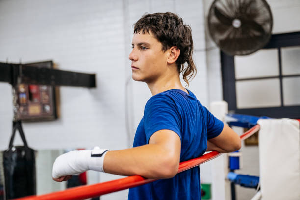 istock Ringside view of contemplative young boxer 2204191209