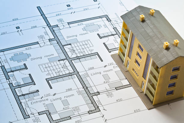 istock Buildings Permit concept with residential building project and condominium 2204192582