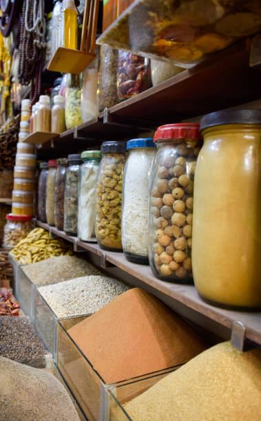 istock Bottled spices like curry and turmeric displayed in bazaar market in Marrakesh 2204195325