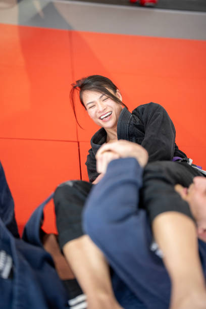 Cheerful Purple Belt Controlling Opponent’s Arm
