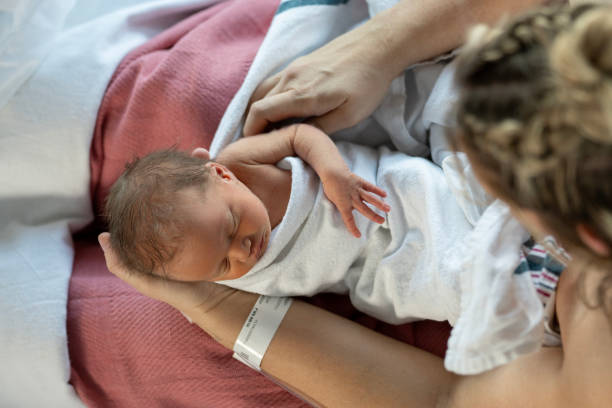 istock Mother’s First Moments Holding Her Newborn 2204199562