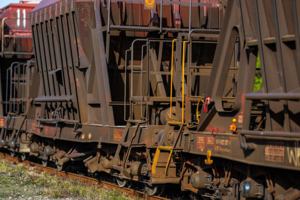 istock blue road sign with right arrow on green grass.. 2204199712