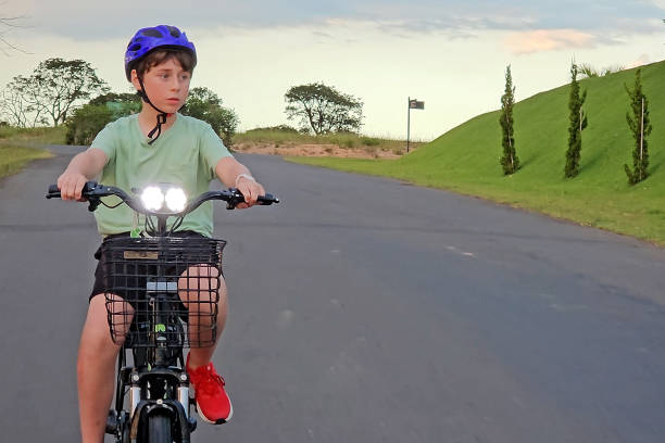 istock Child go on a bike ride 2204205132