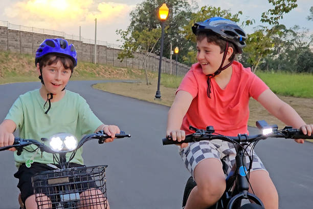 istock Children go on a bike ride 2204205158