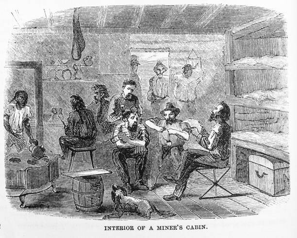 Interior of a Miner's Cabin Illustration from Harper's New Monthly Magazine June, 1865- A Chinese cook works at a stove while a miner repairs his boot in the cramped space of a miner's cabin in Bodie, California. miners cabin stock illustrations