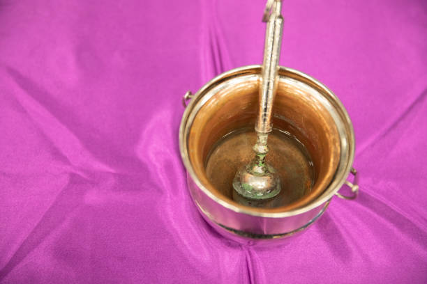 Holy water for funeral service in a religious Christian or catholic chapel