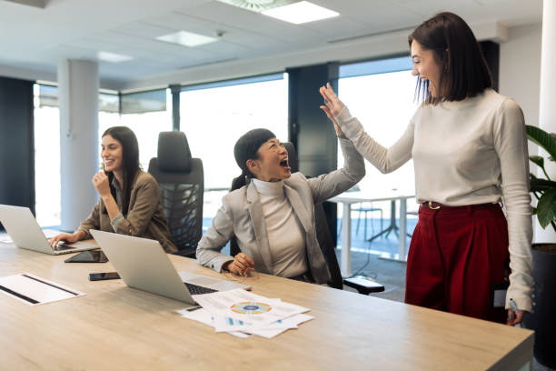 istock Businesswomen brainstorming while working at the modern office 2204220076