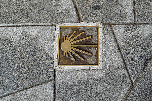 Saint James Way symbol on the pavement, indicating the pilgrimage route