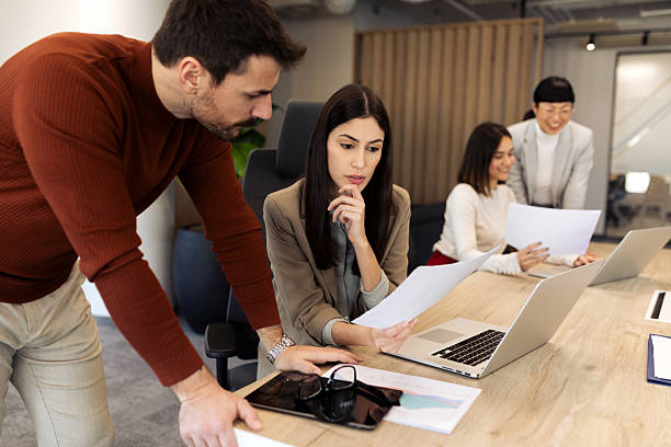 istock Young and successful business team working in the office 2204224065