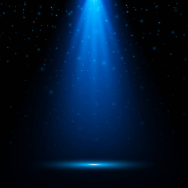 istock The spotlight shines. Bright Llight from a lamp or spotlight. Stage lighting spotlight, scene, stage lighting large, projector light effects. Vector illustration. 2204225420