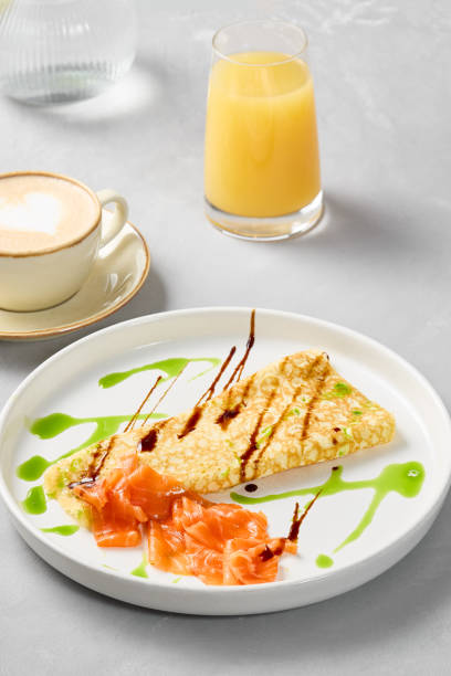 Elegant Breakfast Setting with Salmon Omelette on Minimalist Plate