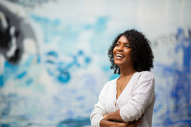 istock smiling young african american woman 2204226943