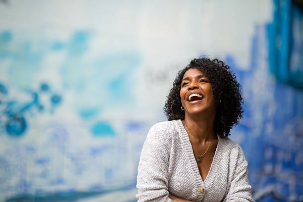 istock young african american woman laughing 2204226980