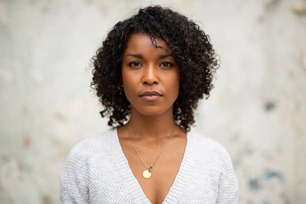 istock Close up young woman with serious expression 2204226988