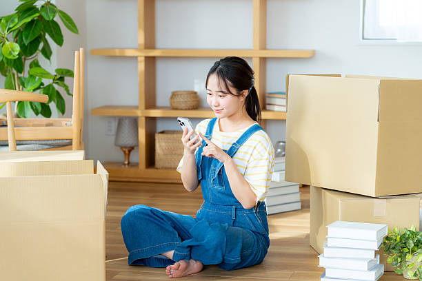 Young woman preparing to move