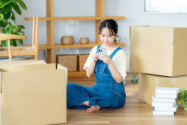 istock Young woman preparing to move 2204229535
