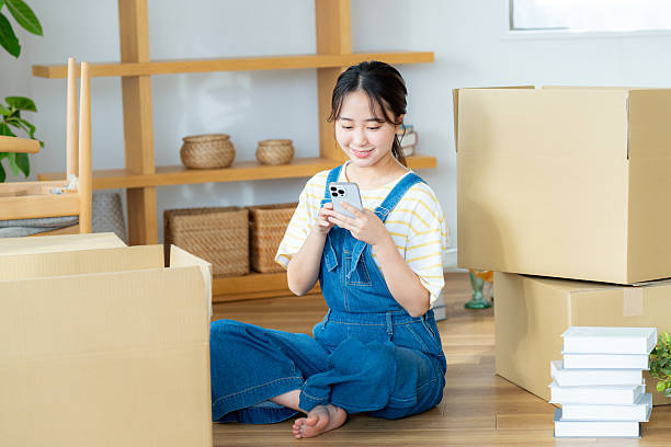 istock Young woman preparing to move 2204229536
