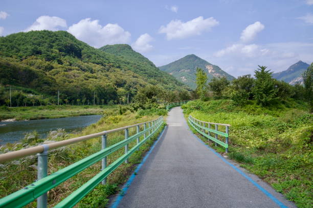istock Seomjingang Bike Path Through Mountainous Countryside 2204231061